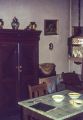 Eetkamer, keuken en herd met eten op tafel. Kluisstraat 2-4 rond 1960. Voor meer details klik hier.