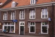 De winkel van Piet van Zutphen in de voormalige domineeswoning. Voor meer details klik hier.